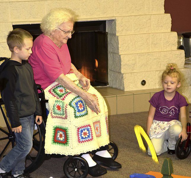 Intergenerational Pre-K Drawing Attention